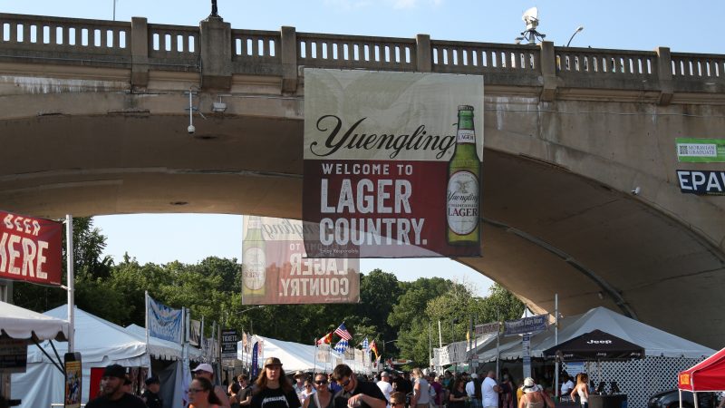 A Yuengling banner reading "Welcome to Lager Country" hanging above Musikfest grounds