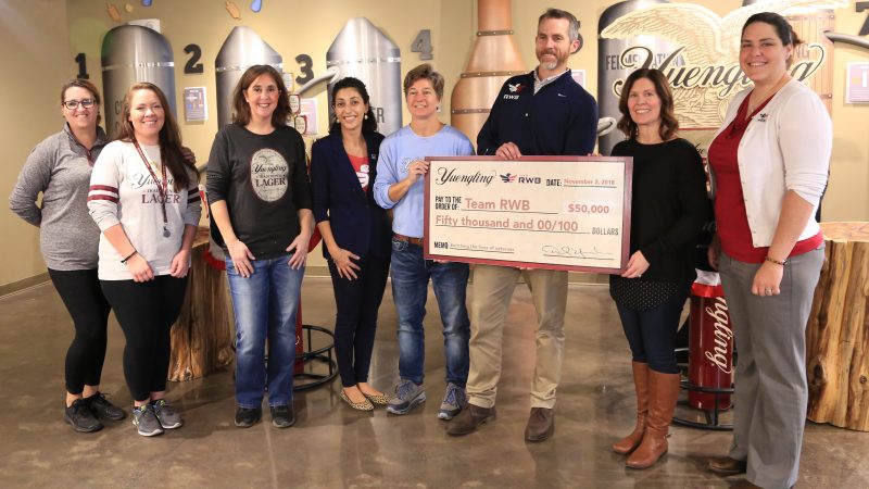 Presenting a check to Team RWB